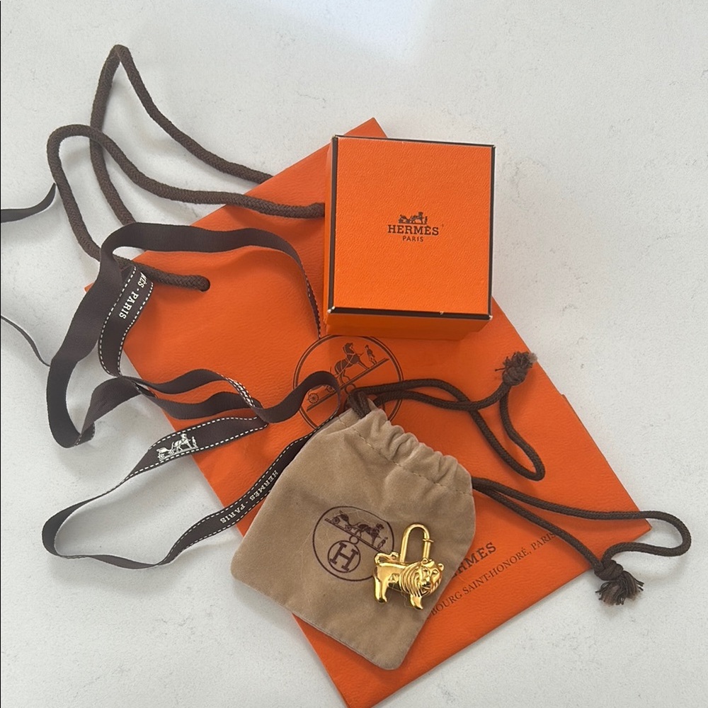 Hermès 1997 lion Cadena lock charm